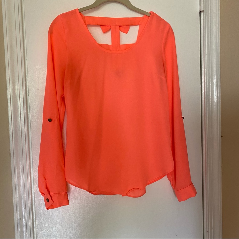Coral Top with lovely bow details!